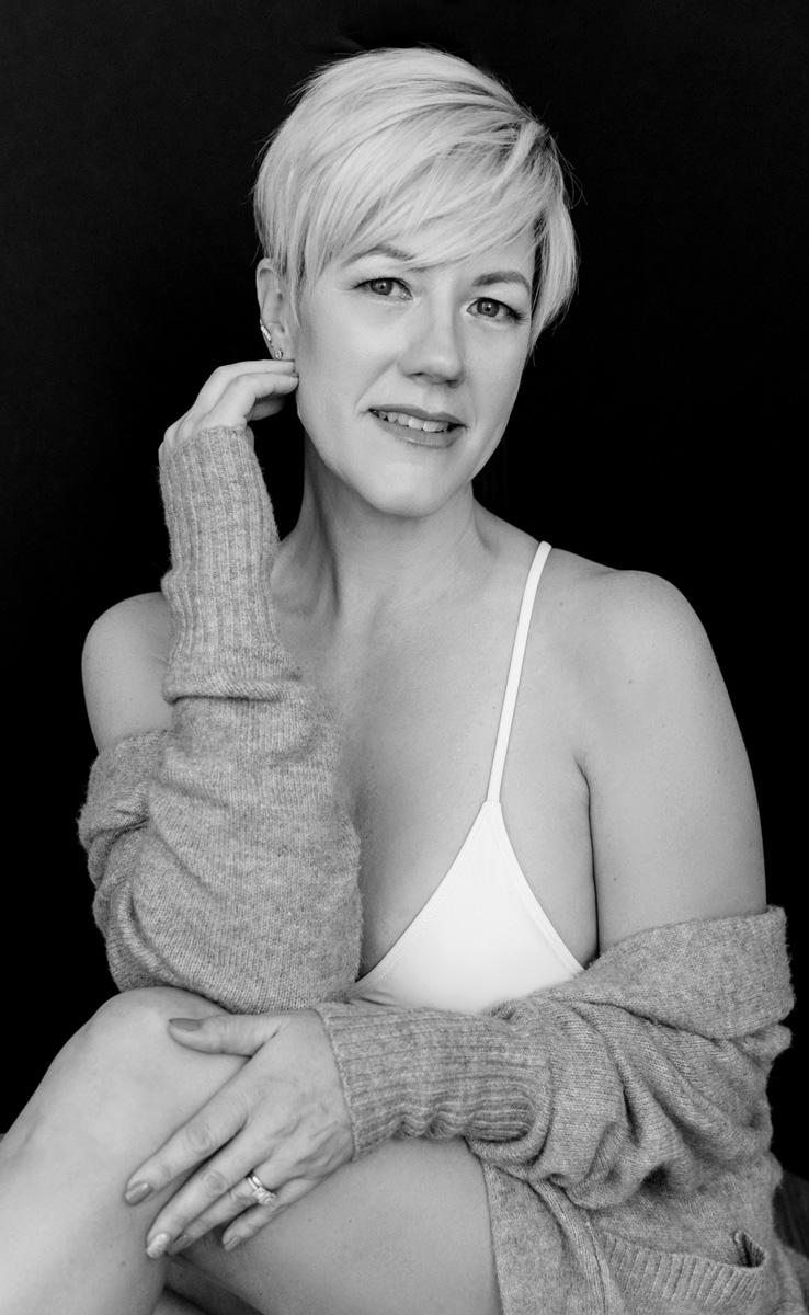 ICONIC Experience 40+ Las Vegas — moody editorial black-and-white full-body portrait of a woman over 40