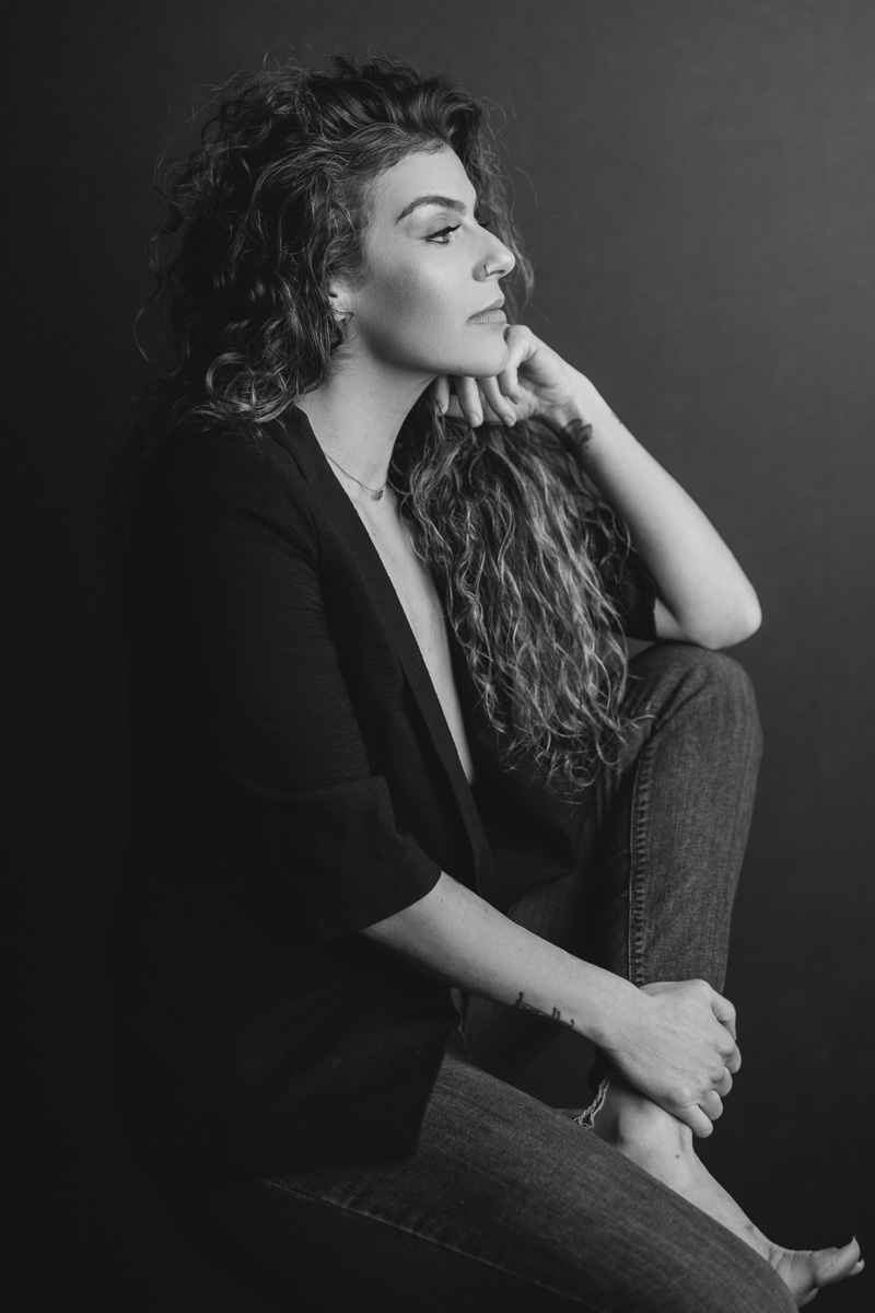 ICONIC Experience 40+ Las Vegas — black-and-white profile editorial portrait of a woman over 40