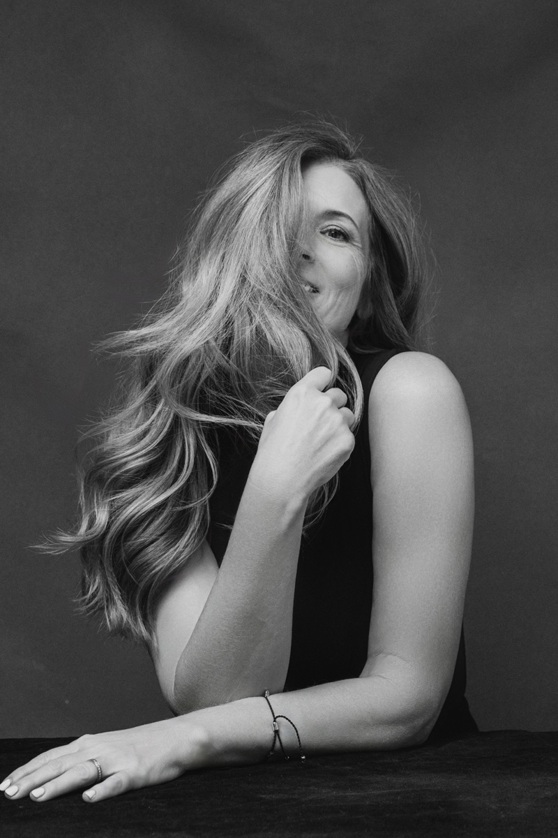 Boise portrait photographer — playful black and white portrait of a woman with flowing hair